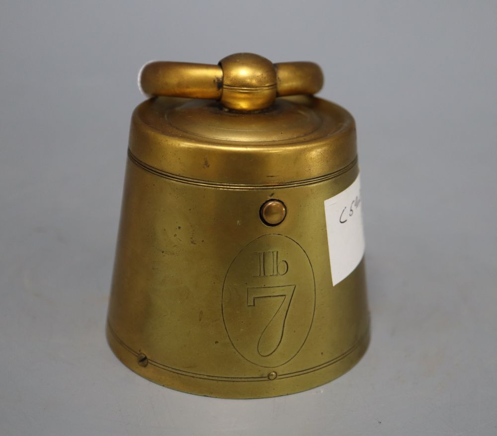 A Victorian gilt brass 7lb novelty inkwell, height 9cm handle down